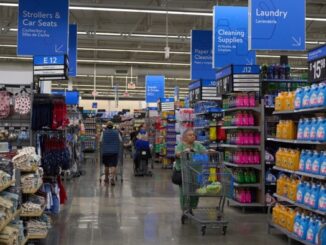 People shop in a Walmart store in Los Angeles