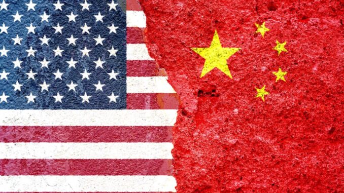 Illustration of United States and China flags painted on a cracked wall.
