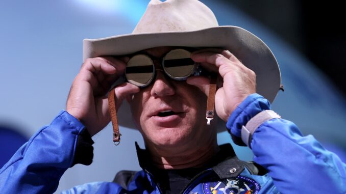 Bezos' Blue Origin debuts satellite service to rival SpaceX, Amazon