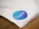 Canva logo on bag sitting on a table.