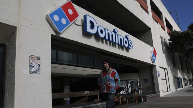 Gas prices hurt restaurant spending at Domino's, Applebee's