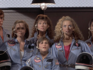 Still from SpaceCamp showing the cast about to board the shuttle