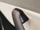 The interior door handle of a Tesla Model 3 electric vehicle at a pop-up Tesla Inc. store on its opening day in Riga, Latvia, on Friday, Aug. 21, 2026. Tesla Inc. and at least eight other carmakers are recalling millions of cars in China over safety concerns with their door handles. Photographer: Andrey Rudakov/Bloomberg via Getty Images