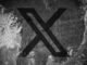 X (formerly Twitter) logo on a cracked wall