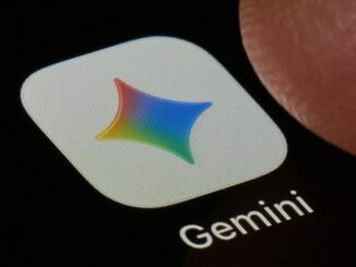 A macro close-up photograph shows the Google Gemini AI app icon