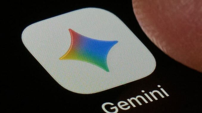 A macro close-up photograph shows the Google Gemini AI app icon